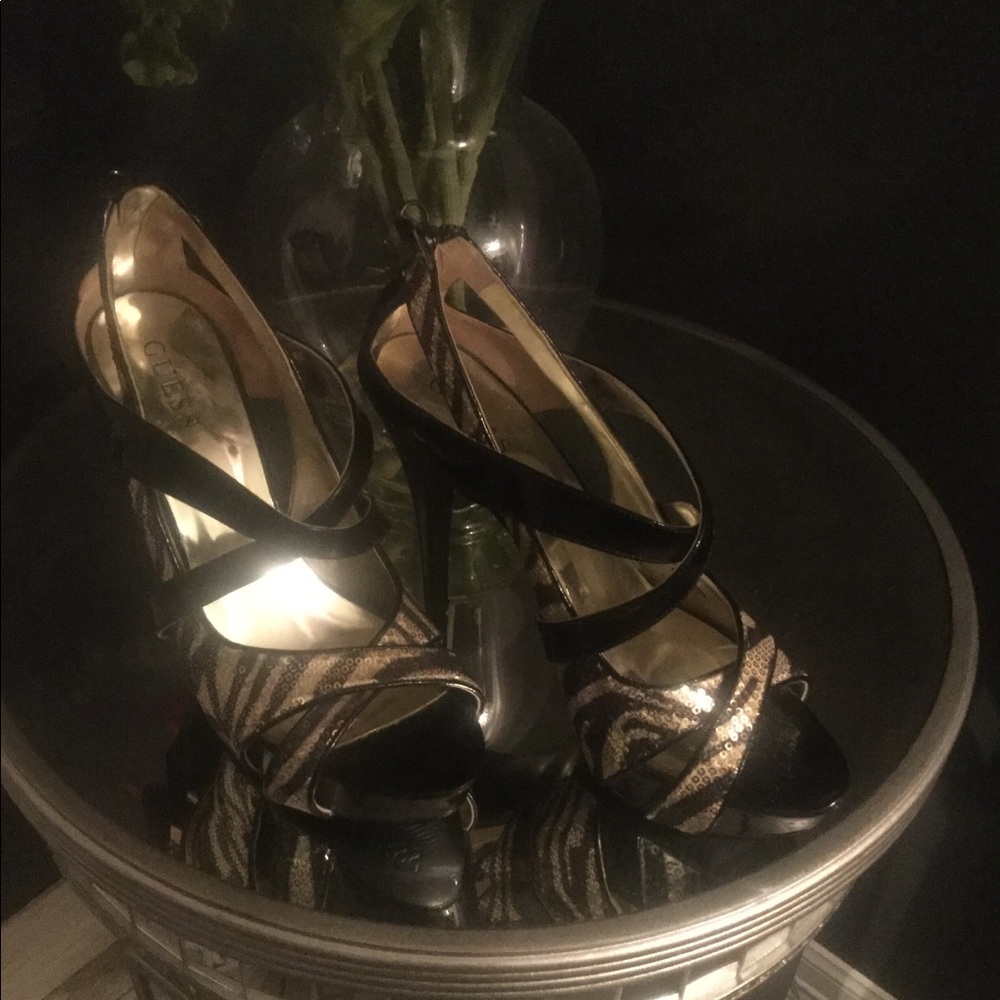Gold and black zebra heels by Guess
